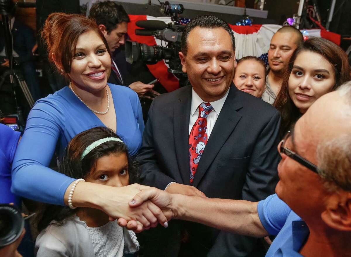 Candidate for Harris County Sheriff Ed Gonzalez, his wife, Melissa, left, and their daughter Erika,7, are greeted by supporters during election watch party at Fitzgerald's, 2706 White Oak Dr., Tuesday, Nov. 8, 2016 in Houston.