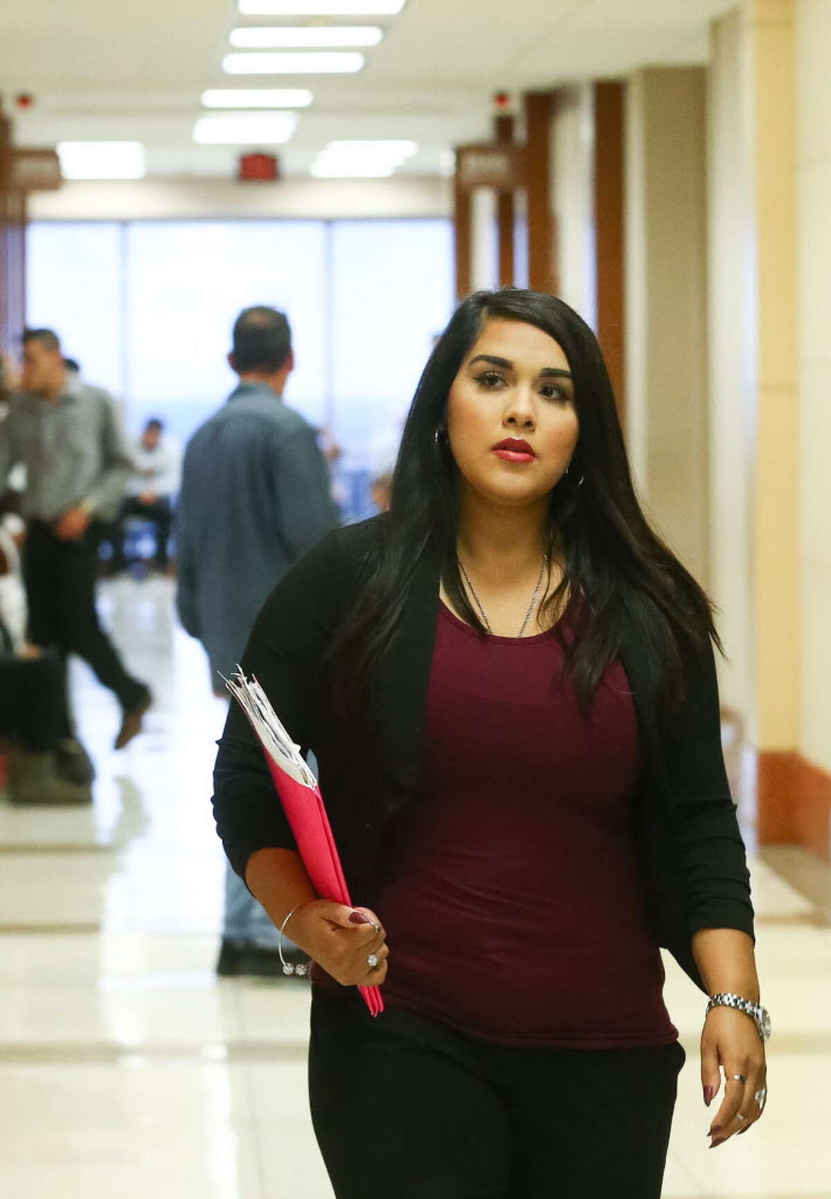 Alexandria Vera, 25, a former Aldine ISD teacher accused of having a sexual relationship with a student, walks into court Wednesday, Nov. 9, 2016, in Houston.