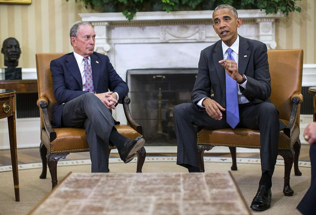 FILE-- President Barack Obama, with former New York City Mayor Michael Bloomberg, delivers remarks on the Trans-Pacific Trade Partnership in the Oval Office, Washington, Sept. 16, 2016. While both major-party presidential candidates oppose the partnership, polls continue to show that Americans either narrowly favor international trade generally, and the so-called TPP specifically, or are split. (Al Drago/The New York Times)
