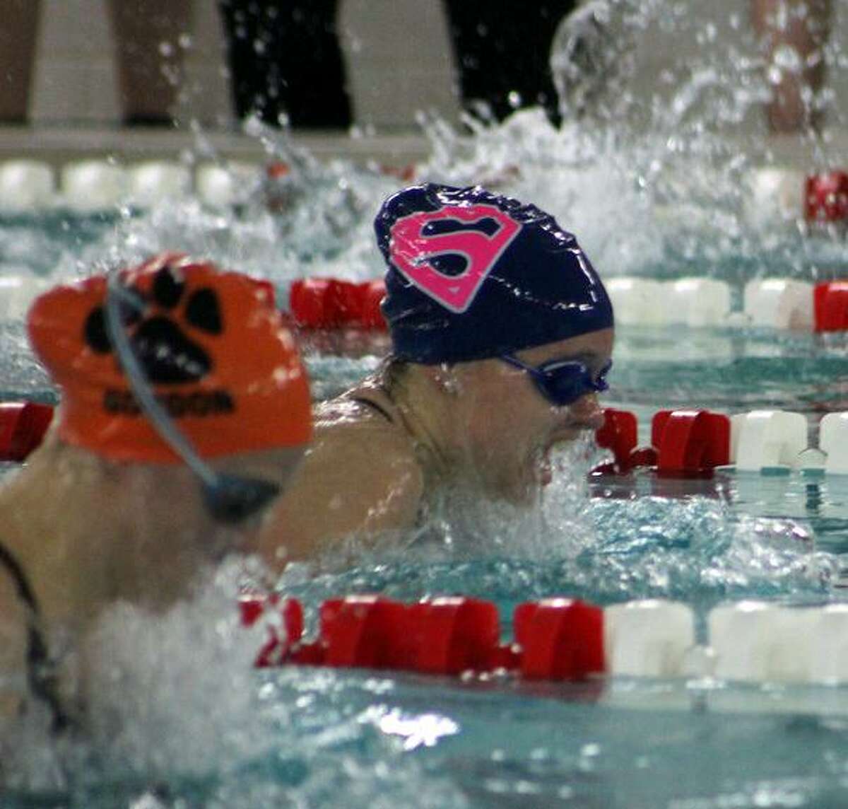 Staples junior Willow Woods finished in second in the 100 breaststroke at the FCIAC championships last week.