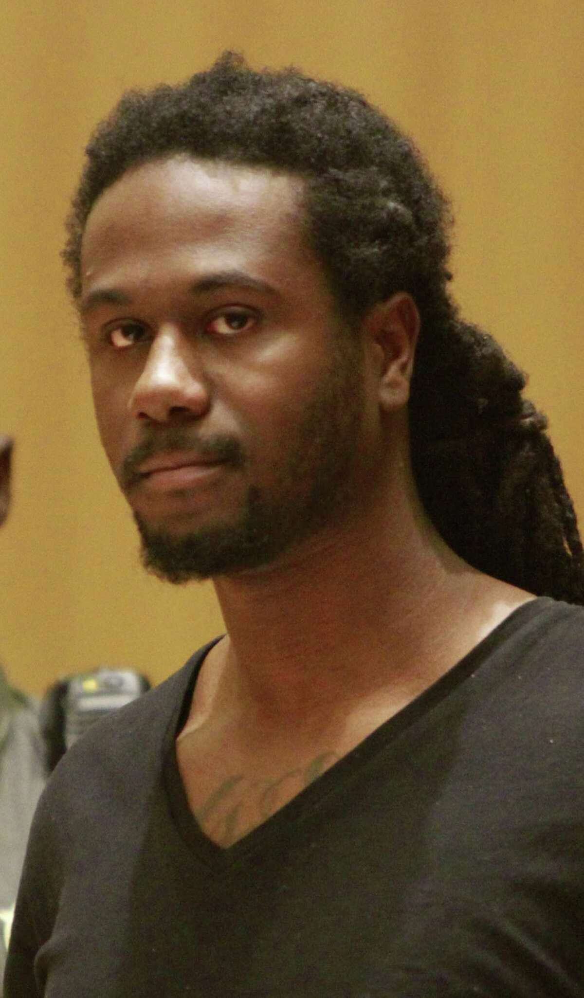 DeShawn Hayes. stands with his court appointed Public Defender Howard Ehring during his arraignment at Connecticut Superior Court on Nov. 3, 2015 in Stamford. Hayes is charged with Conspiracy to Murder in connection with the shooting death of a 43-year-old woman found Monday night in Lione Park of Stamford's West Side.