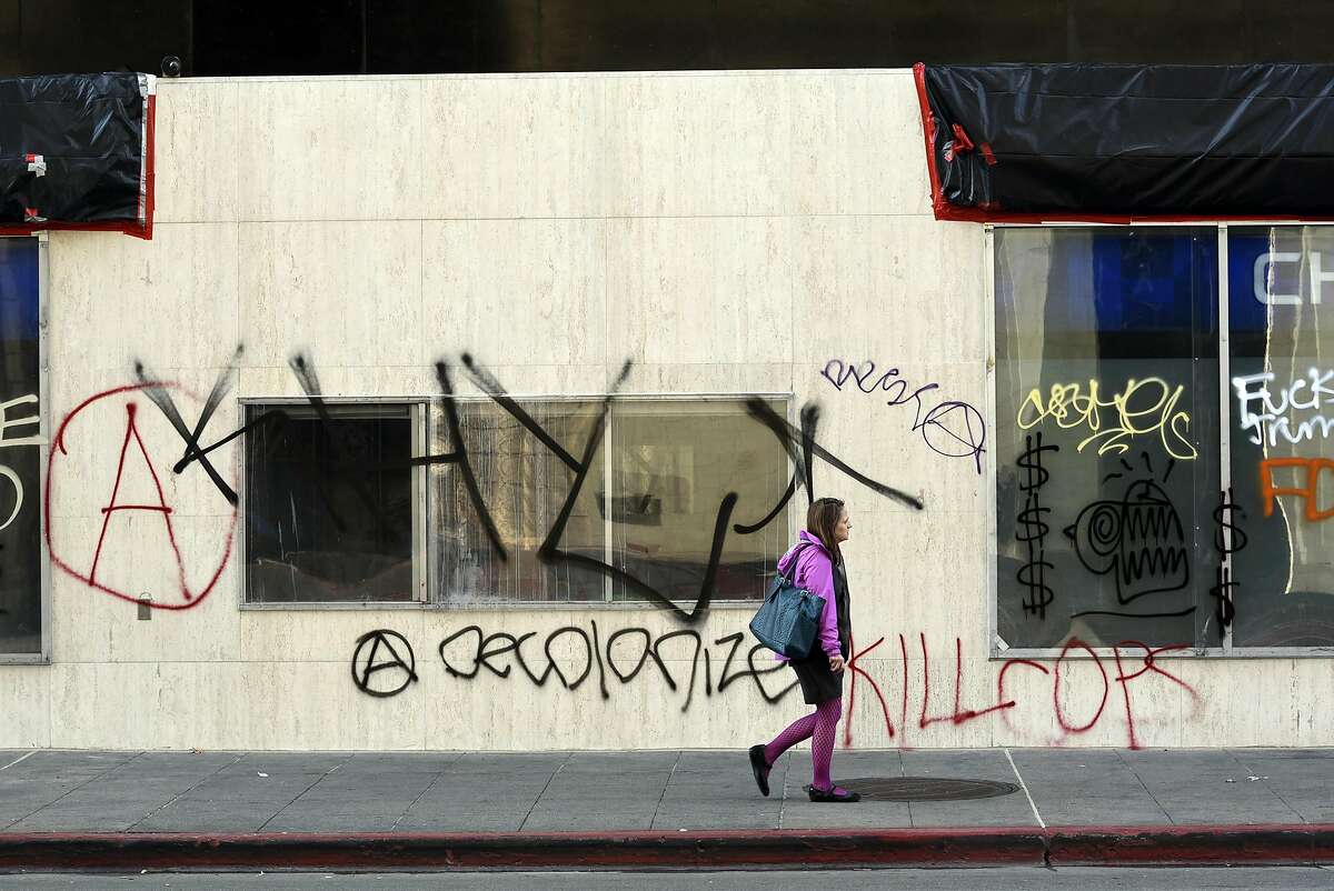 Graffiti covers Chase Bank 14th St. and Broadway following overnight protests against the election of Donald Trump, in Oakland, CA, Thursday, November 10, 2016.