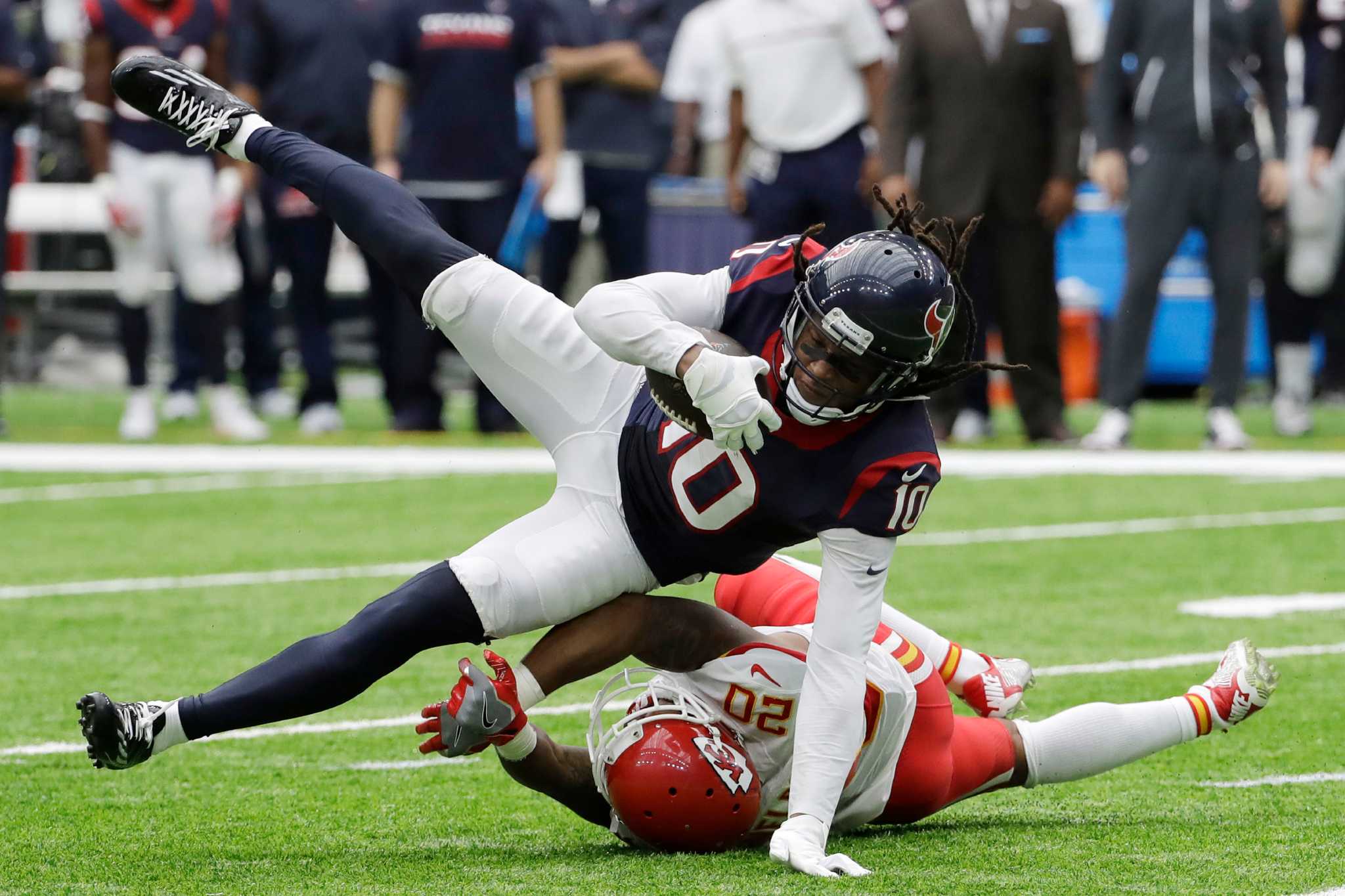 Wide receiver Braxton Miller of the Houston Texans is tackled by