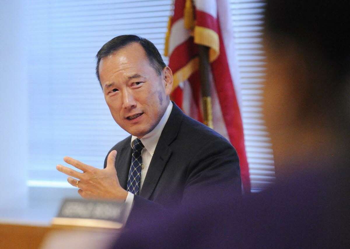 FILE — First Board of Education meeting with new Superintendent of the Stamford Public Schools, Earl Kim, at the Stamford Government Center, Conn., Tuesday night, July 26, 2016.