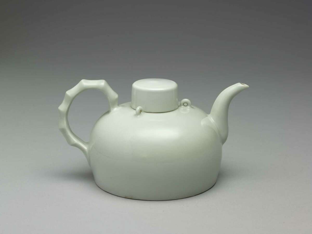 A teapot with a "sweet-white" glaze, which dates to reign of Emperor Yongle, is on view in "Emperors' Treasures."