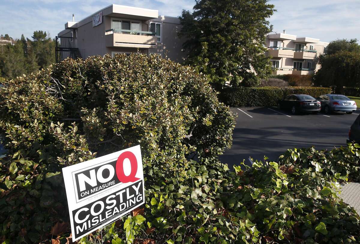 No on Measure Q signs and banners are displayed in front of the Oak View apartments on Campus Drive in San Mateo, Calif. on Friday, Nov. 11, 2016. Voters in the city rejected the rent control initiative.
