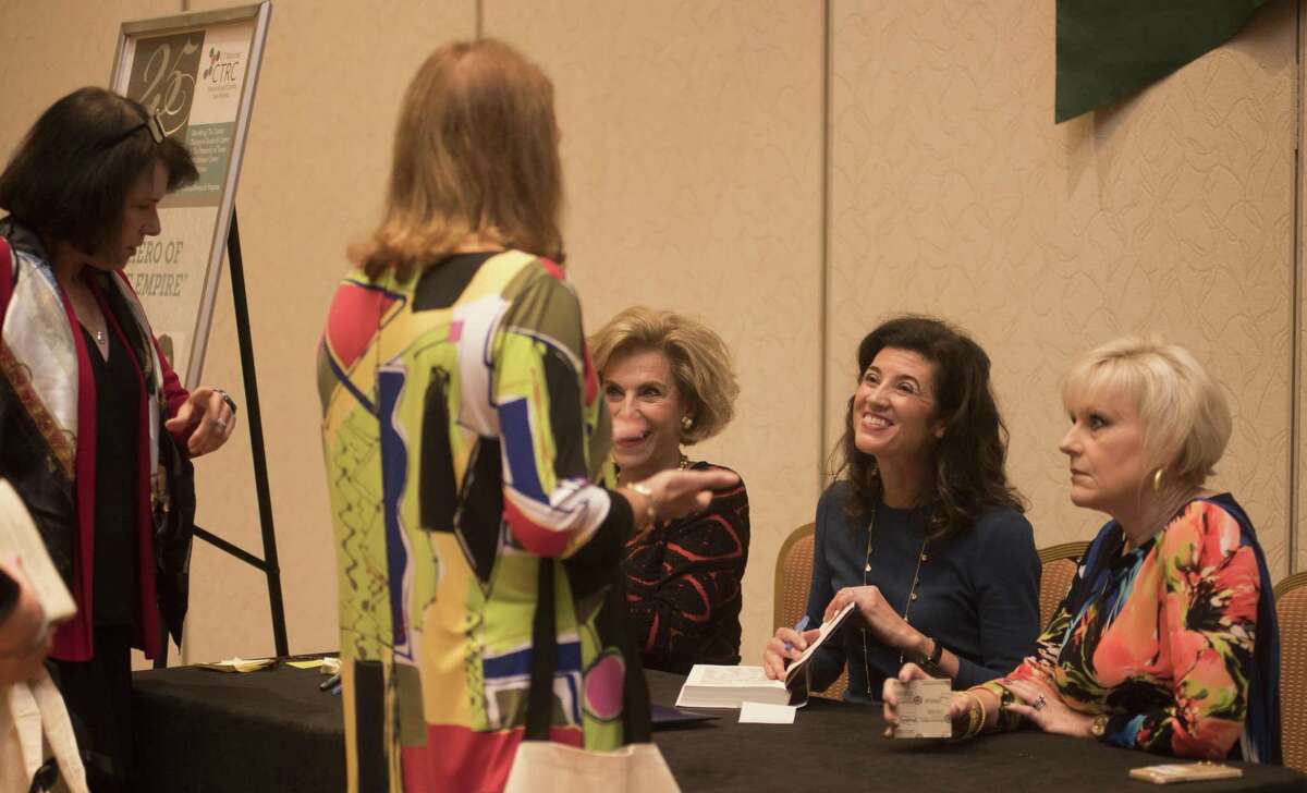Author Candice Millard autographs a book during the 25th annual Express-News Book & Author Luncheon, which raises funds in the fight against cancer at the Marriott Rivercenter on Friday, November 11, 2016.