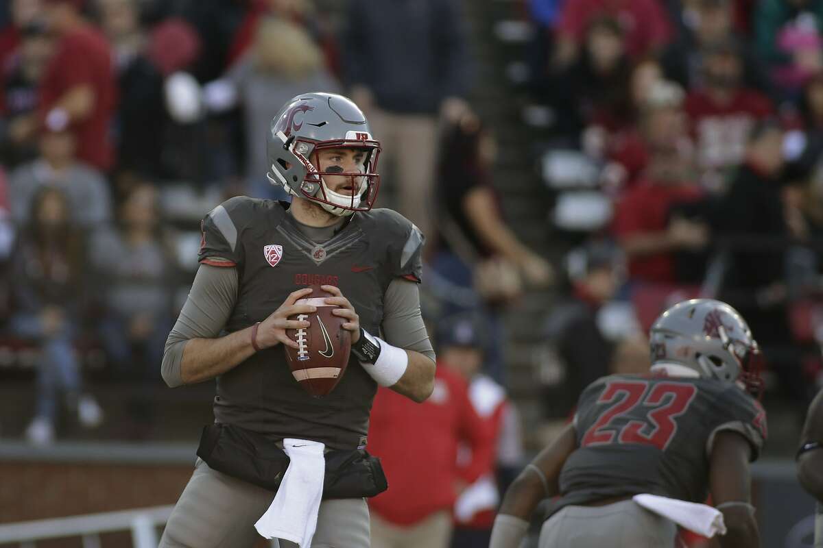 Washington State quarterback Luke Falk (4) looks to pass during the first half of an NCAA college football game against Arizona in Pullman, Wash., Saturday, Nov. 5, 2016. (AP Photo/Young Kwak)