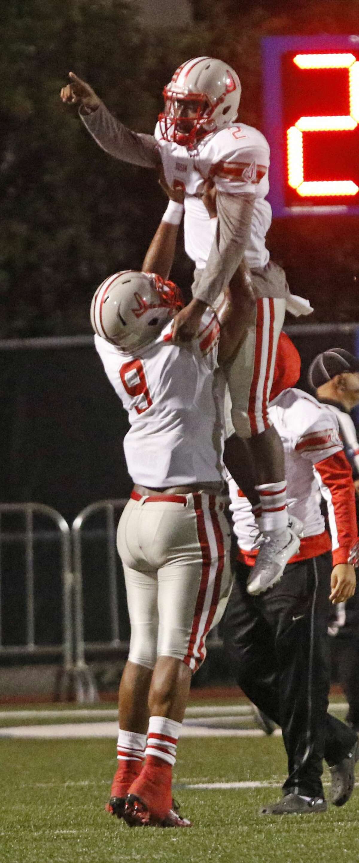 Judson?•s Julon Williams is hoisted by teammate Judson?•s Demarvin Leal after TD from the Class 6A Division I bidistrict high school football playoff game between O'Connor and Judson on November 11,2016 at Farris Stadium.