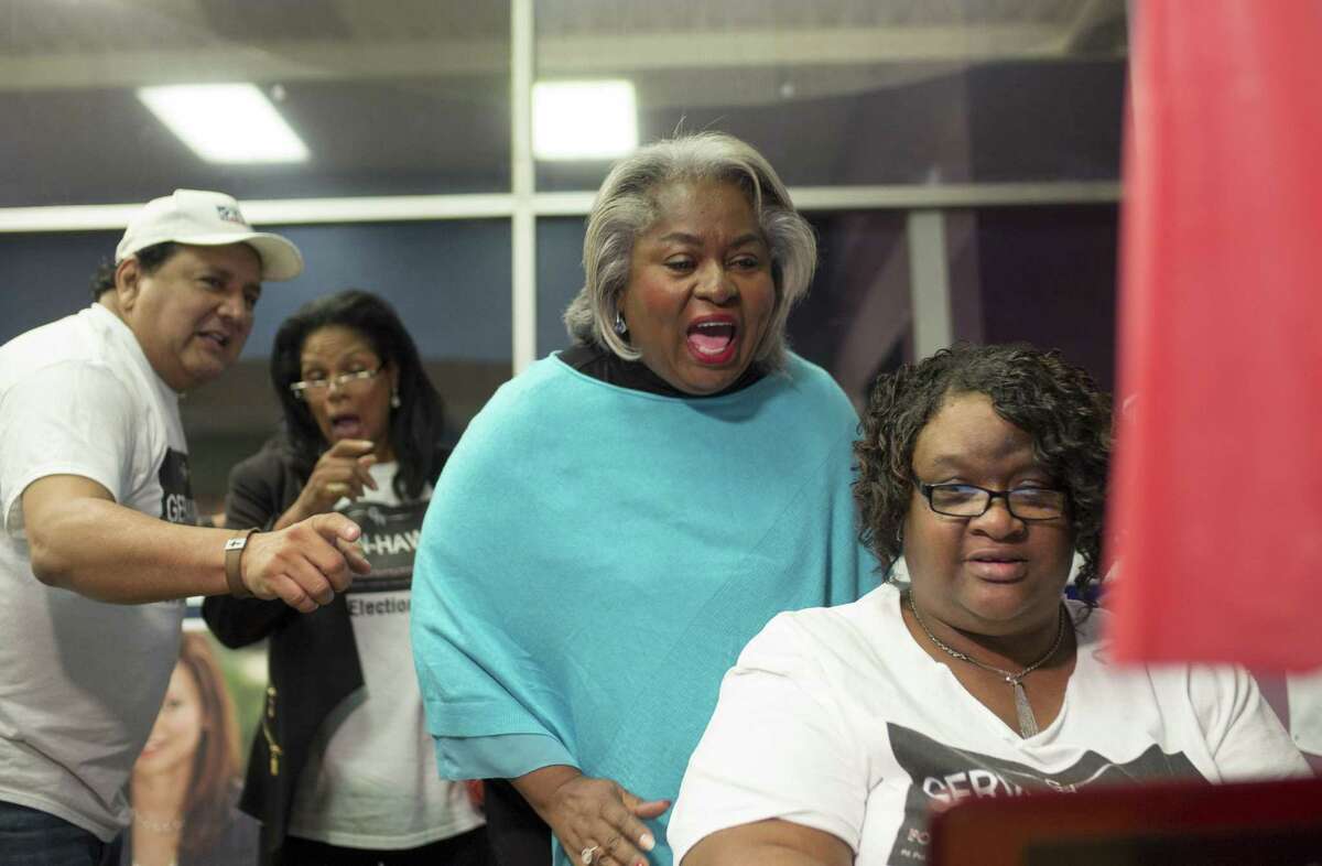 Barbara Gervin-Hawkins, second from right, celebrates a large lead in voting returns with supporters Margaret Richardson, right, Ramon Chapa, Jr., left, and Zarinah Shakir during an election night event, Tuesday, Nov. 8, 2016, at her campaign headquarters in San Antonio. (Darren Abate/For the Express-News)