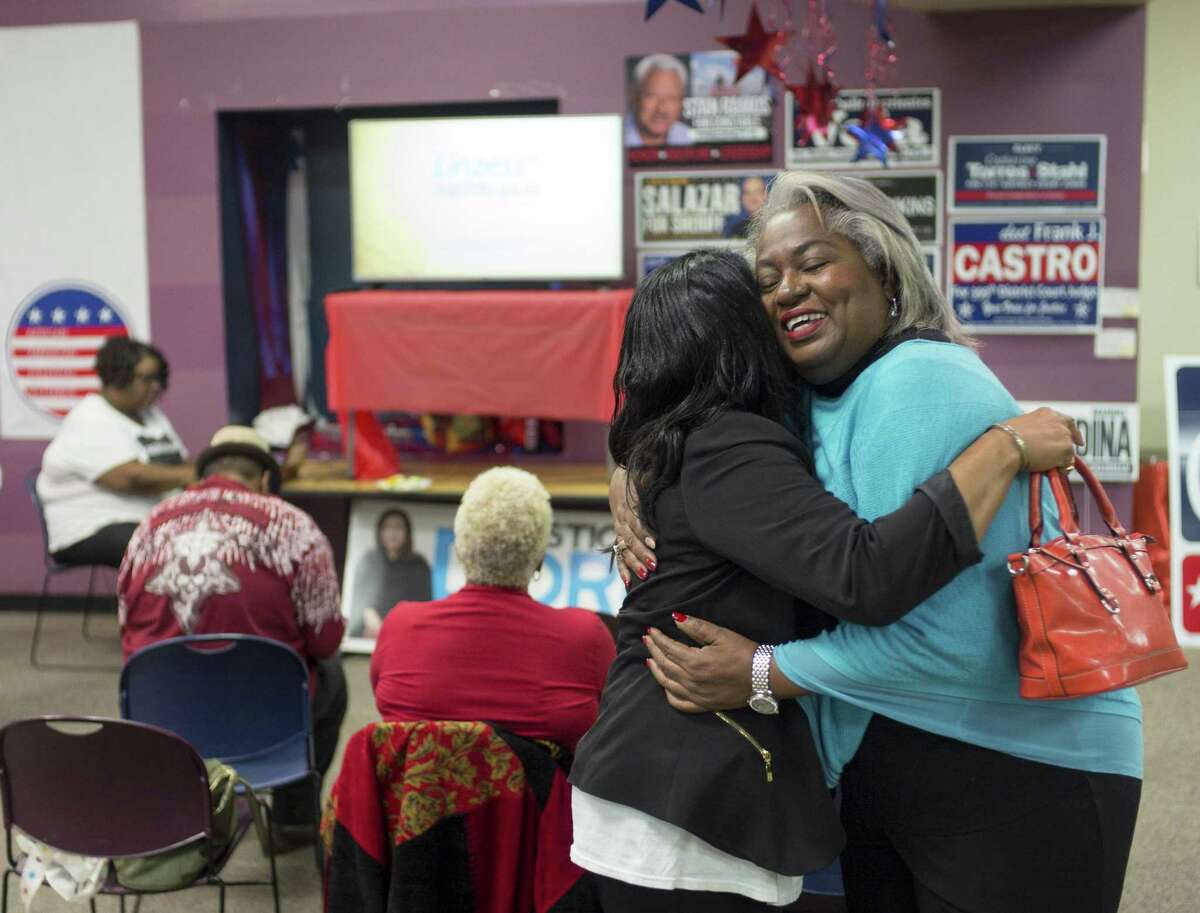 Barbara Gervin-Hawkins, right, celebrates a large lead in voting returns with supporter Zarinah Shakir during an election night event, Tuesday, Nov. 8, 2016, at her campaign headquarters in San Antonio. (Darren Abate/For the Express-News)