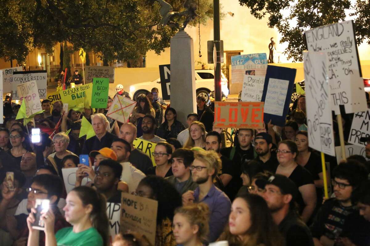 Downtown San Antonio was a busy place Saturday night as about 1,000 anti-Trump demonstrators marched the streets shouting their discontent with the results of the recent election.