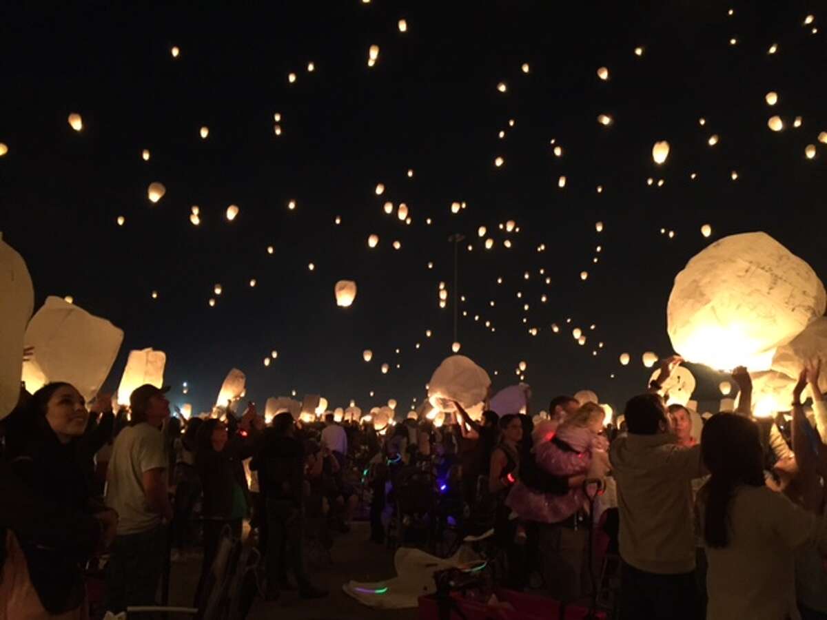 Hundreds gather to light the sky with lanterns at Baytown's Royal