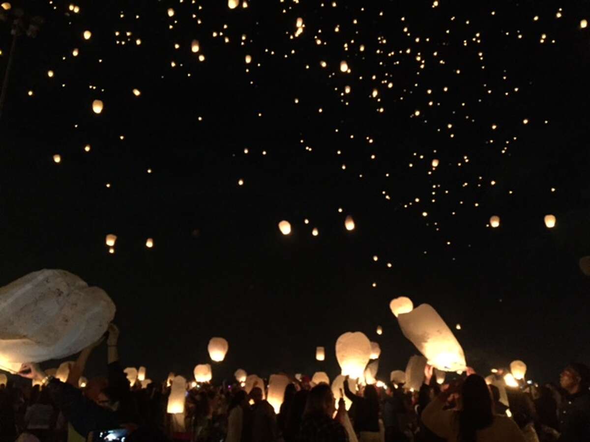Hundreds gather to light the sky with lanterns at Baytown's Royal