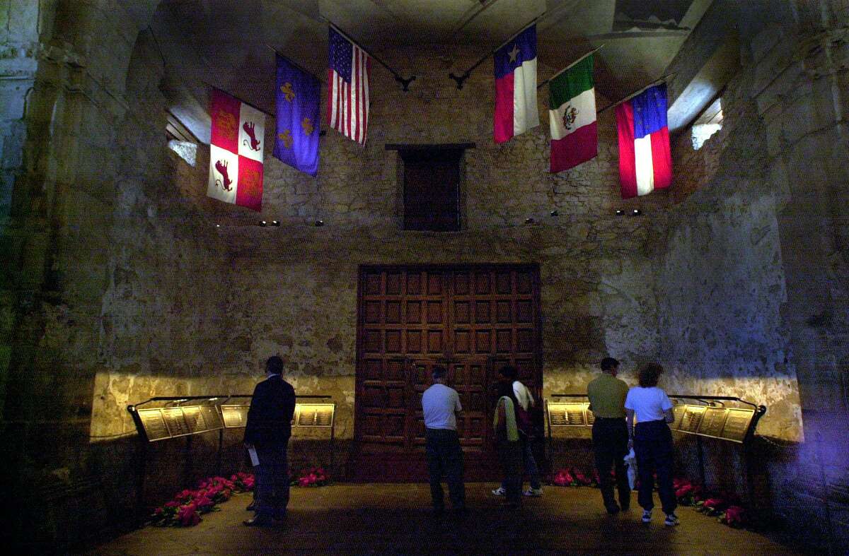 Visitors to the Alamo previewed a newly completed restoration of the mission church, after a ceremony held by the Daughters of the Republic of Texas in 2001. Fourteen plaques were removed from the wall inside the shrine to prevent deterioration and placed on stands.