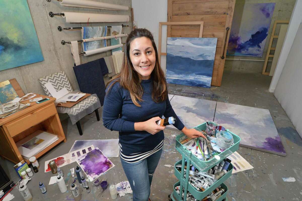 Artist Julia Contacessi with her paint trolley as she works on her latest Tryptik painting in her studio on Tuesday November 1, 2016 in Norwalk Conn