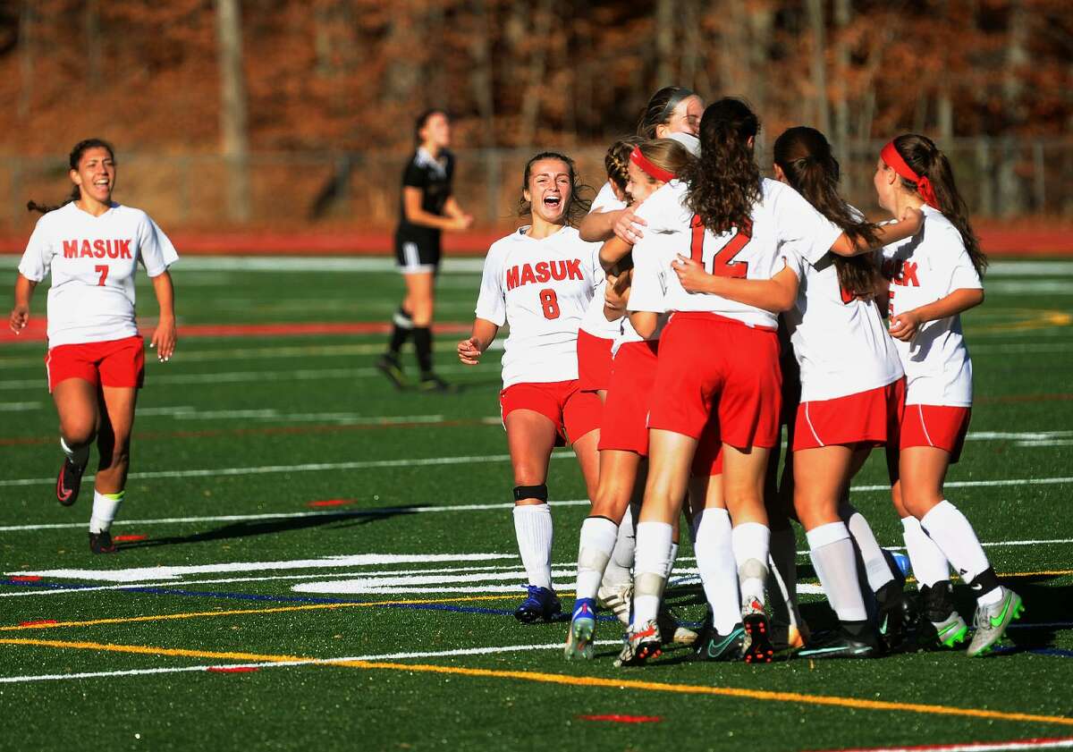 Masuk celebrates their opening goal during their victory over Joel Barlow in the quarterfinals of the Class L state girls soccer tournament at Masuk High School in Monroe, Conn. on Sunday, November 13, 2016.