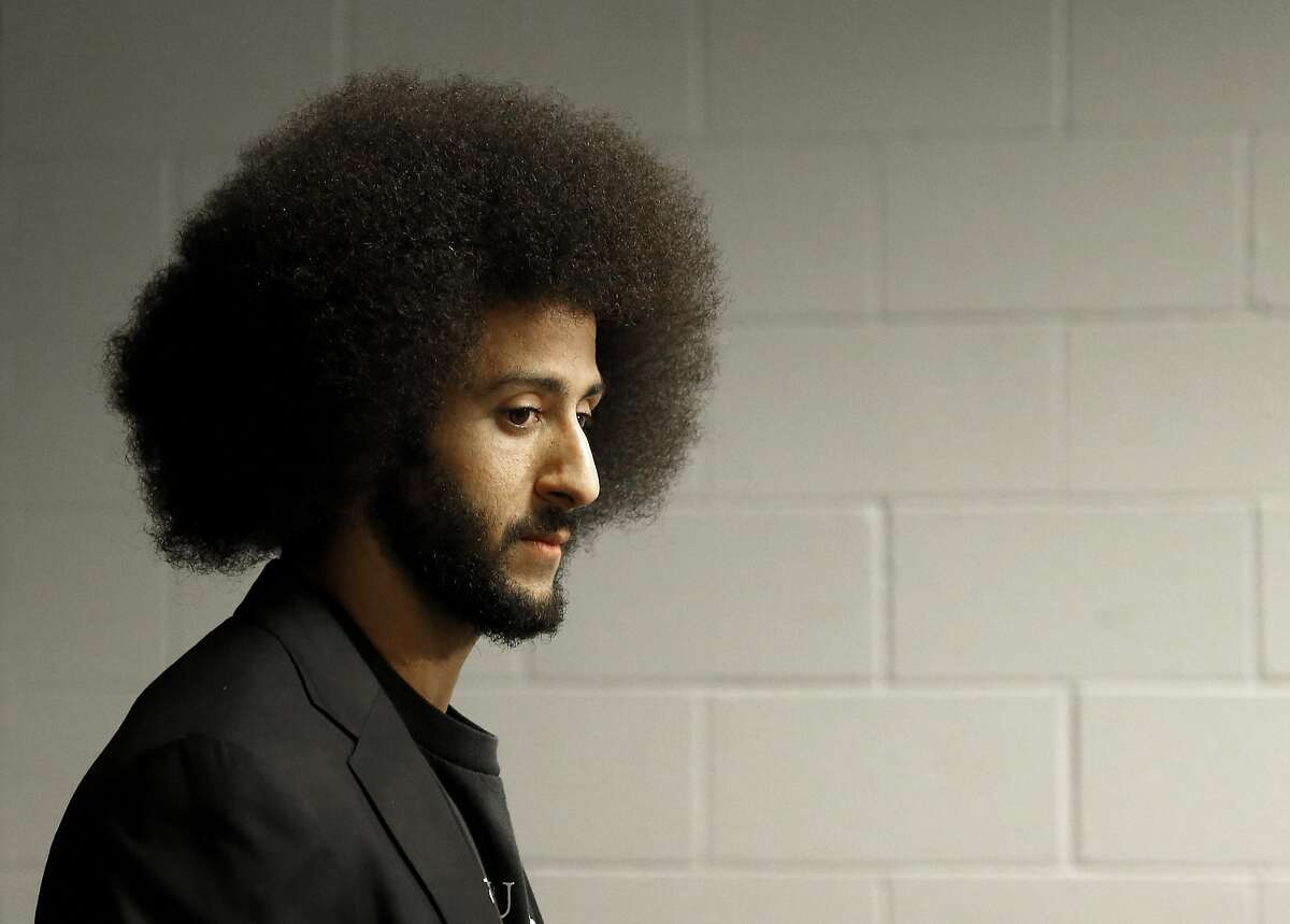 San Francisco 49ers quarterback Colin Kaepernick speaks after an NFL football game against the Arizona Cardinals, Sunday, Nov. 13, 2016, in Glendale, Ariz. The Cardinals won 23-20. (AP Photo/Ross D. Franklin)