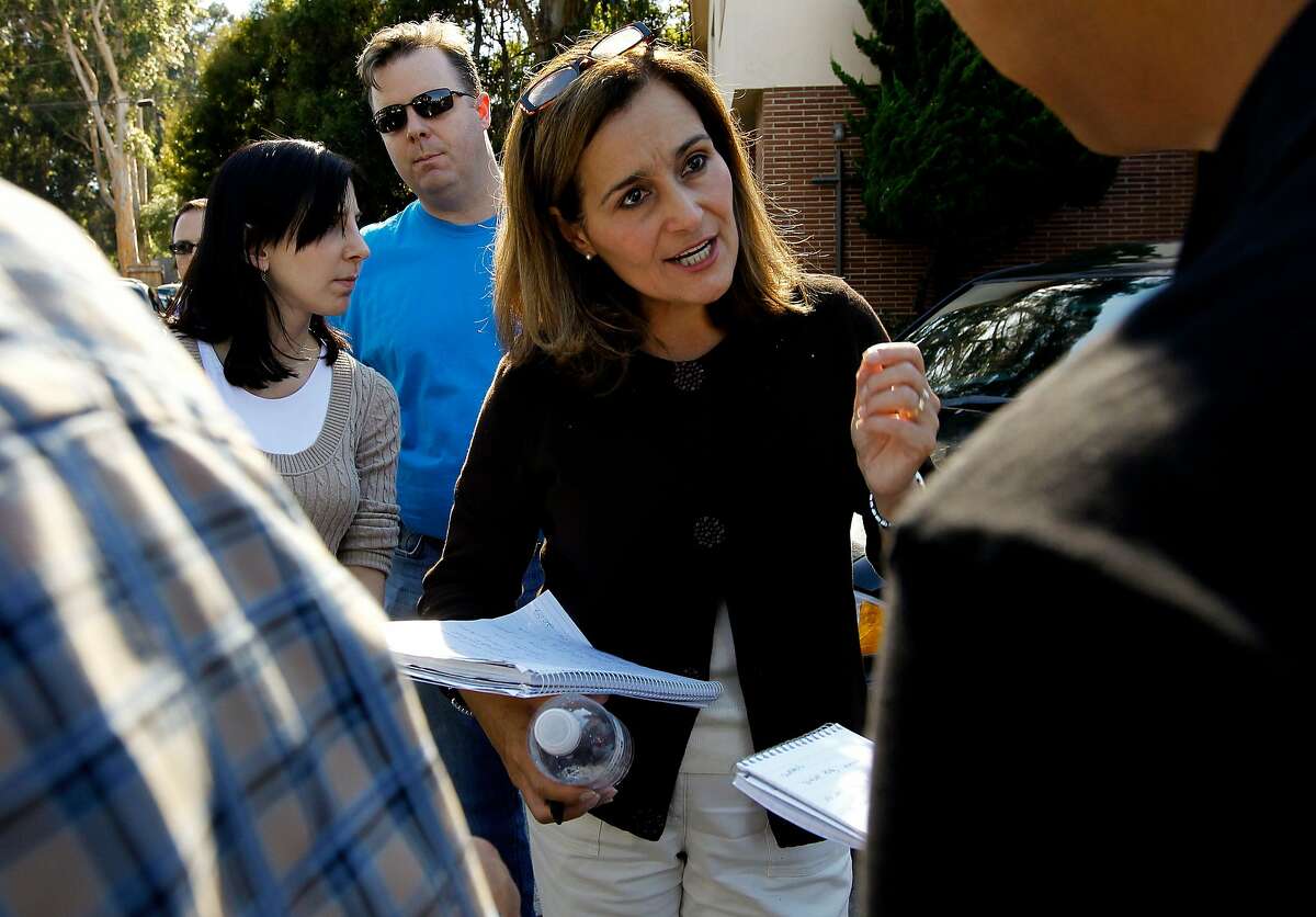 Geisha Williams, Senior Vice President of Energy Delivery, speaks with reporters after local officials held a Towh Hall meeting at St. Robert's Catholic church, on Saturday Sept. 11, 2010, in San Bruno, Calif., to inform those affected by the natural gas explosion and fire that occured last Thursday evening.