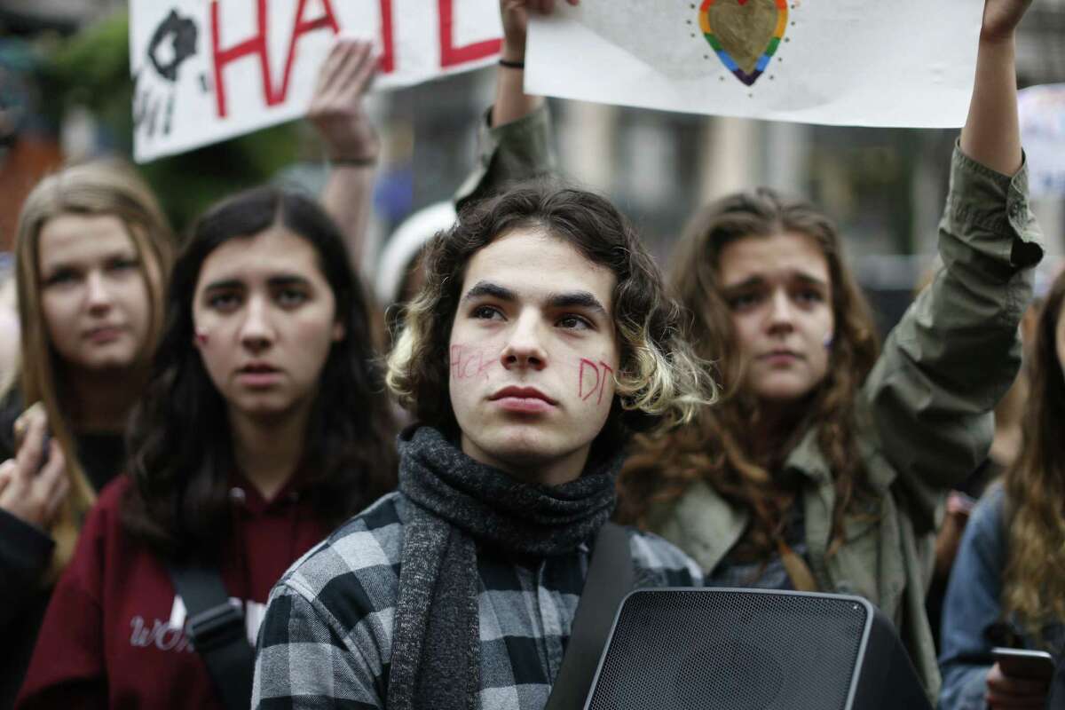 Portland Public School students walked out of schools Monday, Nov. 14, 2016, and converged on Pioneer Courthouse Square for a protest against the results of last week's presidential election. Hundreds of high school students joined protests in Portland on Monday against Donald Trump’s election (Beth Nakamura/The Oregonian via AP)