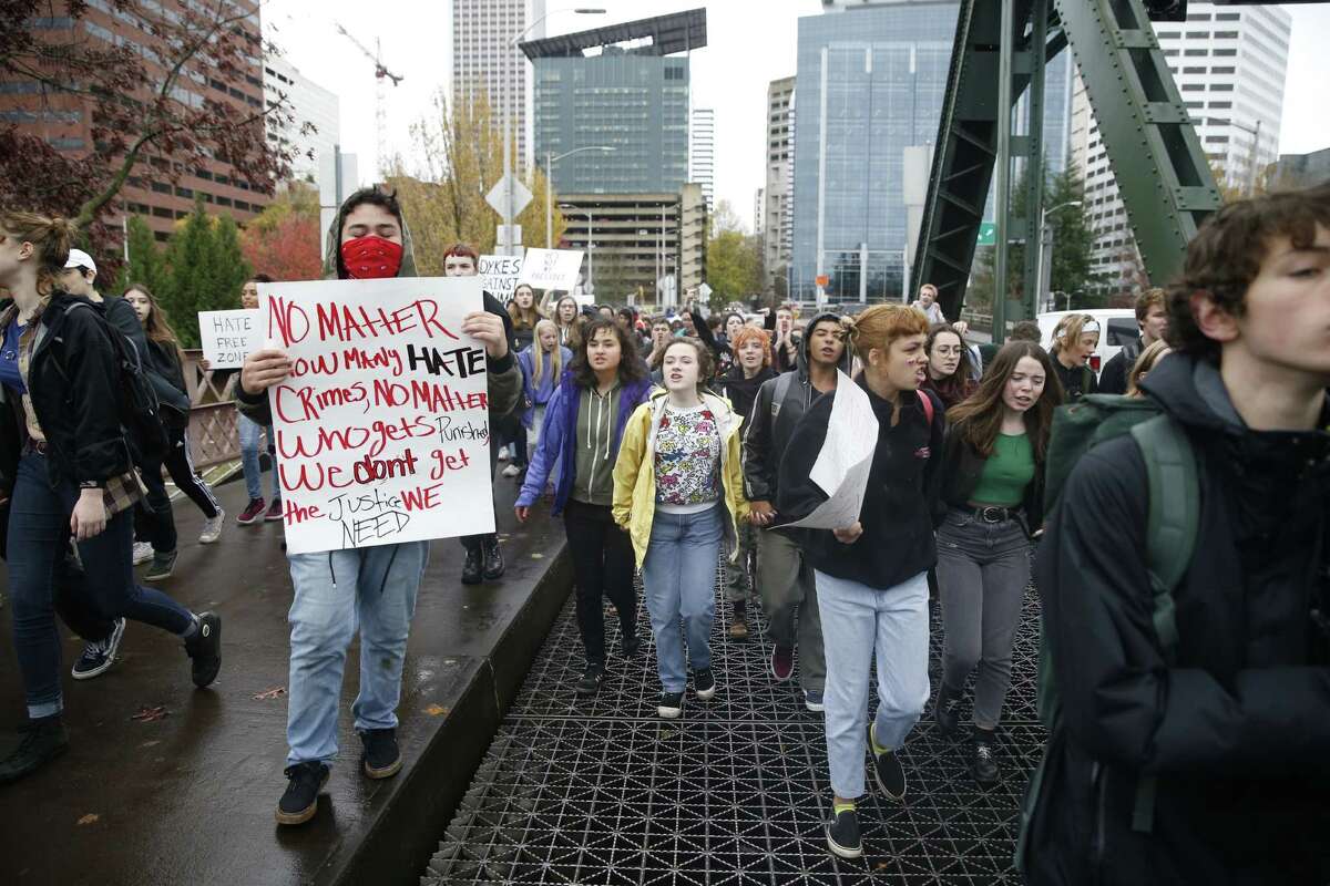 Portland Public School students walk out of schools Monday, Nov. 14, 2016, and converge on Pioneer Courthouse Square for a protest against the results of last week's presidential election. Hundreds of high school students joined protests in Portland on Monday against Donald Trump’s election (Beth Nakamura/The Oregonian via AP)