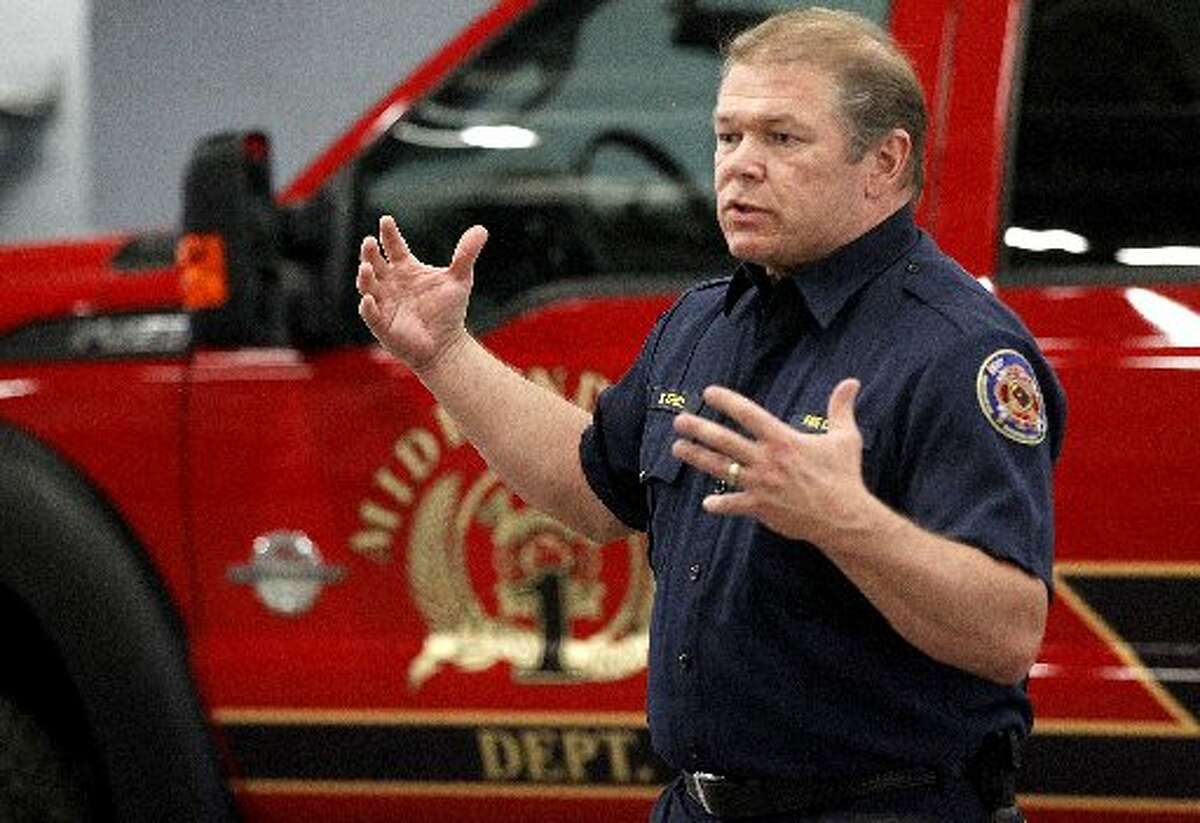 Midland Fire Department Chief Robert Isbell talks about the new mini-pumper fire truck that Concho Resources donated to the department in March 2015. Isbell has been named chief for the city of Round Rock.