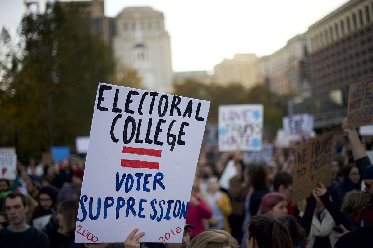 Protestors demonstrate against President-elect Donald Trump outside Independence Hall November 13, 2016 in Philadelphia, Pennsylvania. The Republican candidate lost the popular vote by more than a million votes, but won the electoral college. 