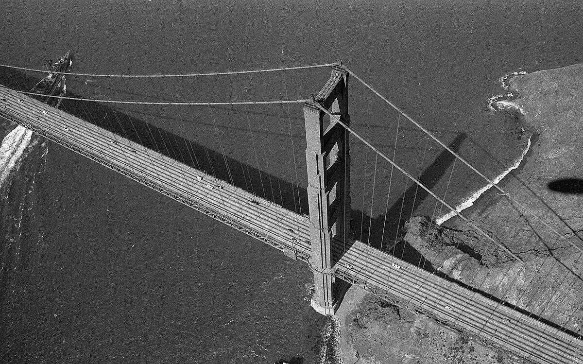 Aerial photos from blimp, June 12, 1975 Envelope is No. 7 of a series of 13 packs, and covers According to the negative pack, covers San Francisco State College Sunset District Public Health Hospital Park Merced George Washington High School Golden Gate Bridge