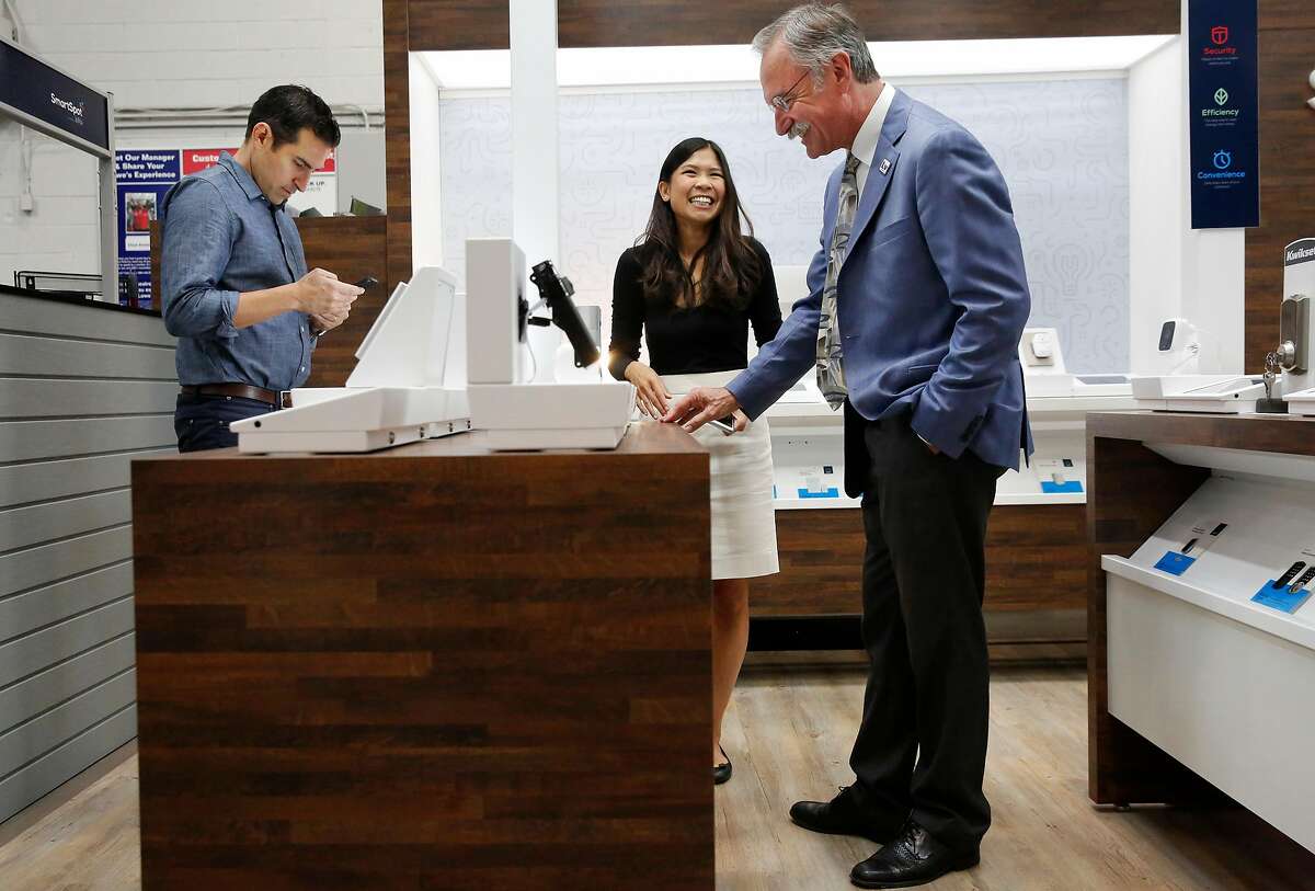 The Mayor of Livermore, John Marchland, right, chats with Monica Yeung, Merchandising Manager at Lowe's, center, and Phillip Raub, Co-Founder and CMO of B8ta, left, during a press event promoting the new SmartSpot by B8ta retail spaces in a few select California Lowe's department stores Nov. 15, 2016 inside the Lowe's in Livermore, Calif. The retail areas showcase "smart home" devices that allow customers to interact with each one and provides a sales representative for questions and concerns.
