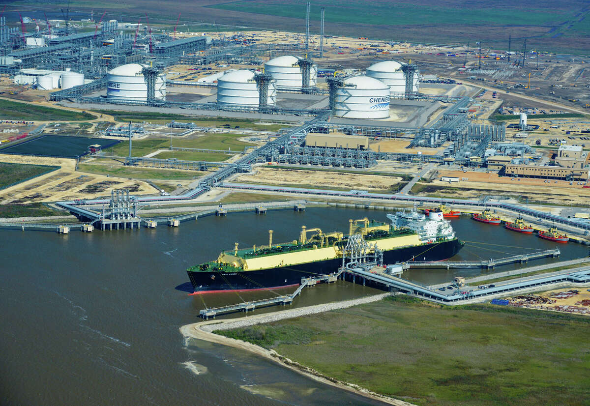 The liquefied natural gas tanker Asia Vision left Cheniere Energy's Sabine Pass export terminal in Louisiana on Wednesday with the first cargo of U.S. shale gas. The carrier ship is shown Wedneday in an aerial photograph taken over Sabine Pass, Texas. (MUST CREDIT: Bloomberg photo by Lindsey Janies)