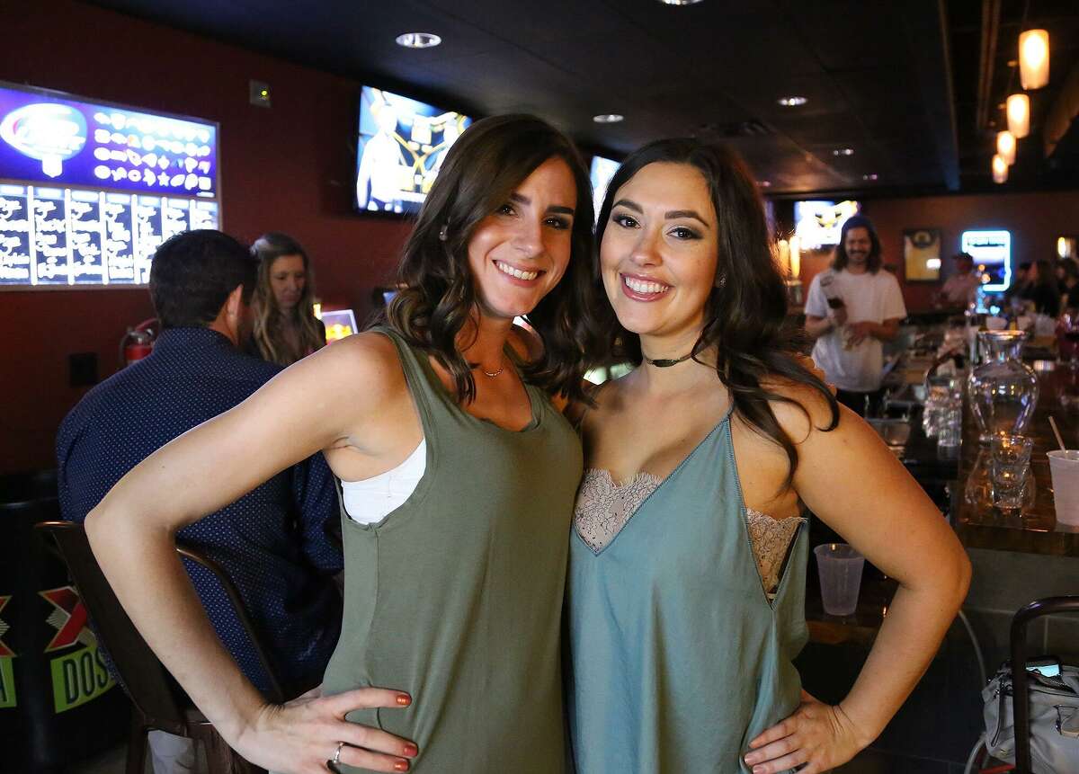 Andrea Edson, 26, left, and Tara Ferrara, 25, hang out together on Saturday, Nov. 12, 2016, at The Ringer Pub, 2826 Thousand Oaks.