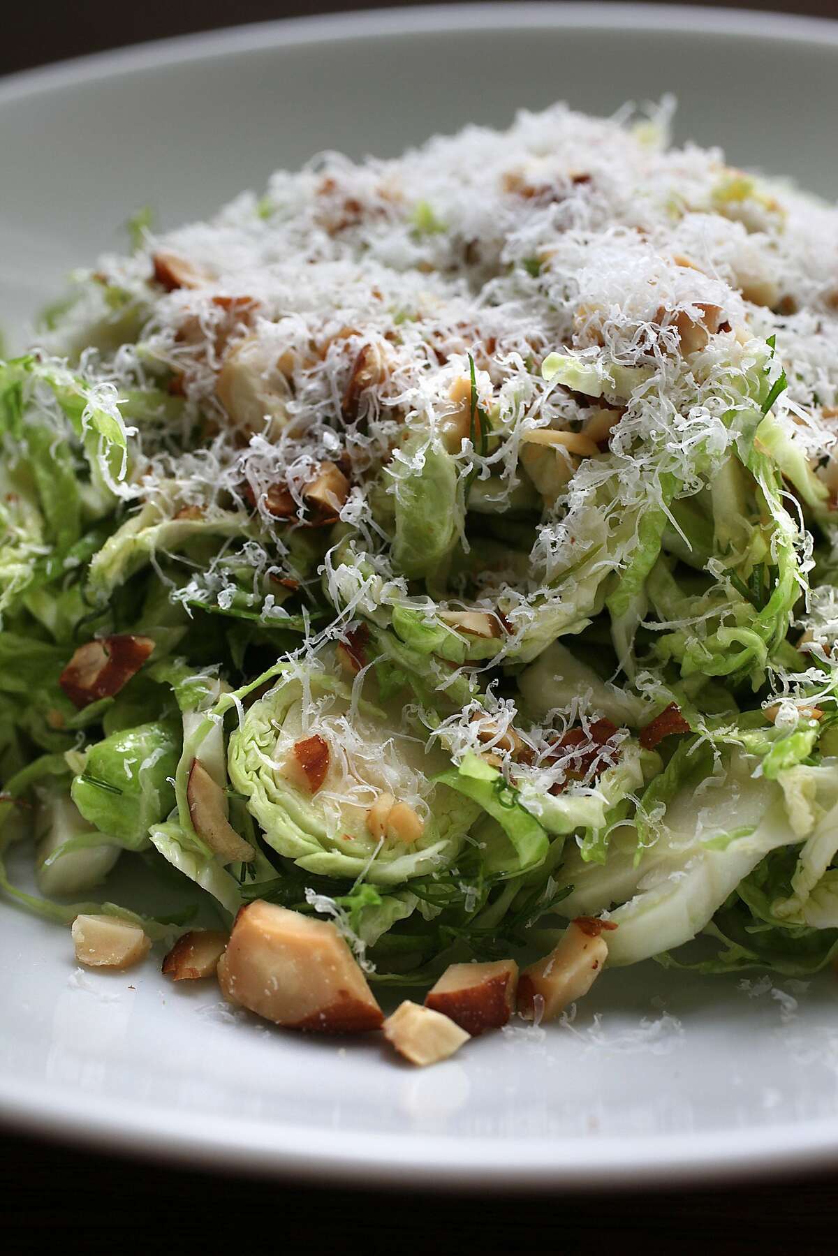 Shaved brussel sprout salad with dill and cheese by Molly Watson in San Francisco, Calif., on Thursday, October 30, 2014.