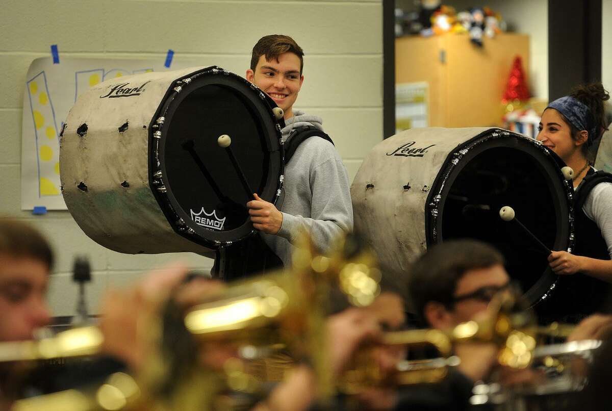 Bass drummers Jack Duda, left, and Madison Touri rehearse with the Trumbull High School Marching Band for their upcoming performance in the Stamford Thanksgiving Day Parade at the school in Trumbull, Conn. on Wednesday, November 16, 2016. The band won the U.S. Bands Class 6 Open National band competition last Saturday, November 12, at Met Life Stadium in New Jersey.