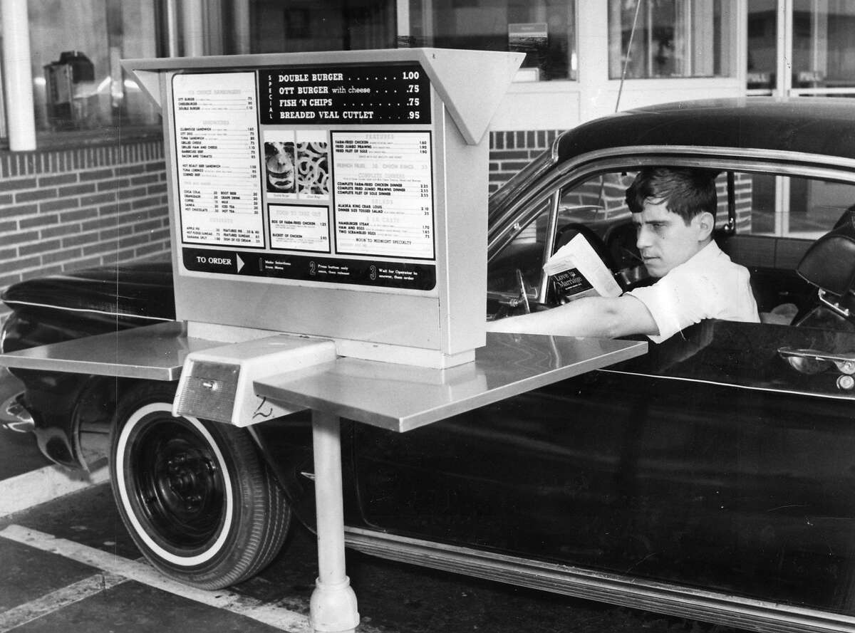 Aug. 7, 1967: A driver gets ready to order at Ott's Drive-in, a Fisherman's Wharf restaurant that was the first in the city to use an automated drive-through.