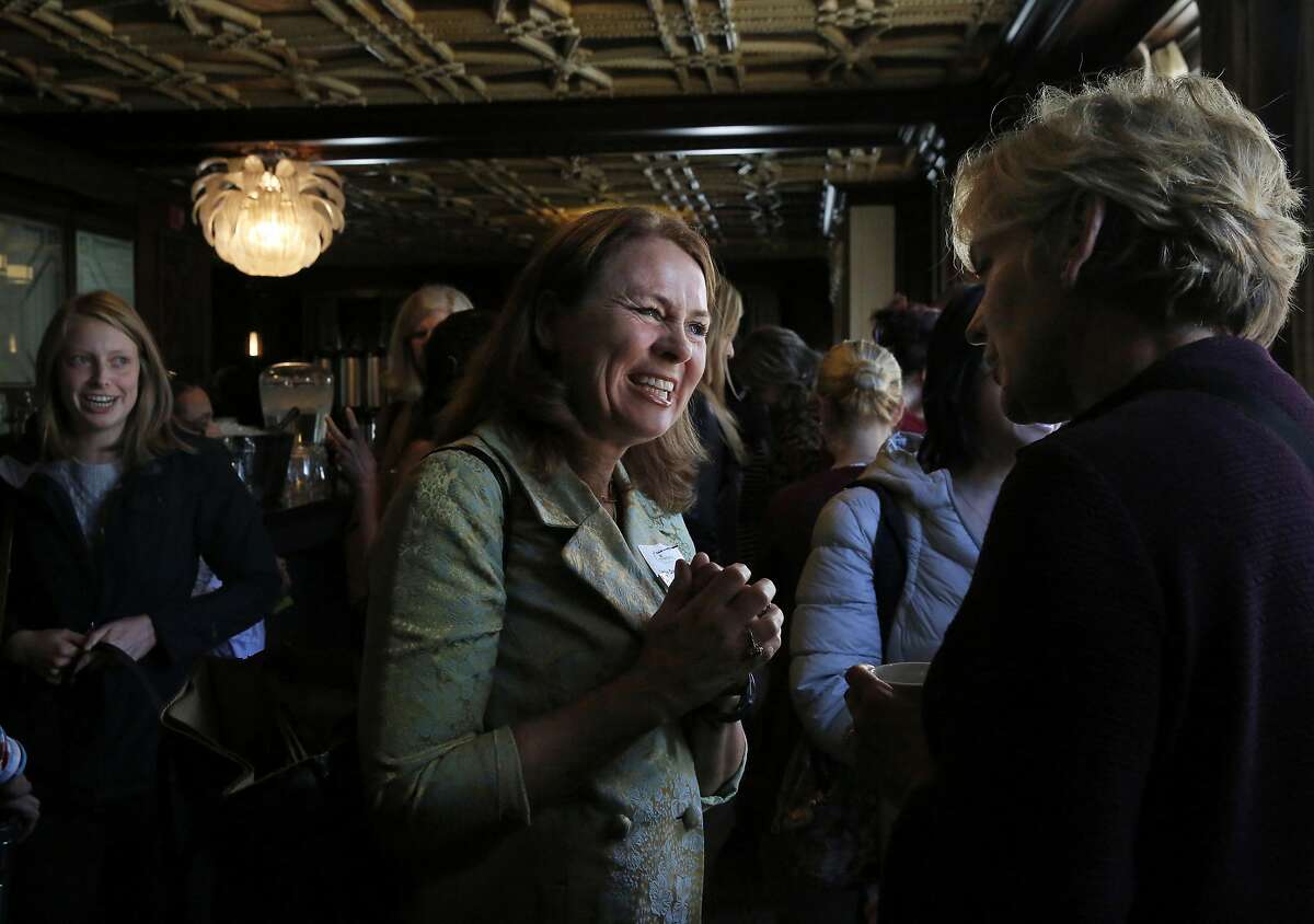Leslie Darwin O'Brien, left, talks with former Governor of Michigan Jennifer Granholm during a gathering of women in politics organized by Emerge America, featuring Granholm as the keynote speaker Nov. 16, 2016 in San Francisco, Calif.