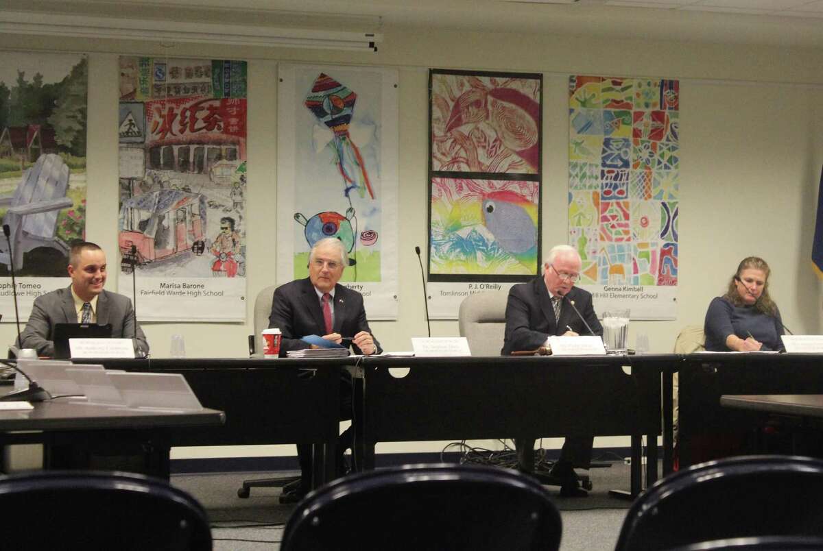 Anthony Calabrese, far left, Philip Dwyer, center right, and Jessica Gerber, far right, were re-elected Board of Education vice chairman, chairman and secretary respectively on Tuesday in Fairfield.