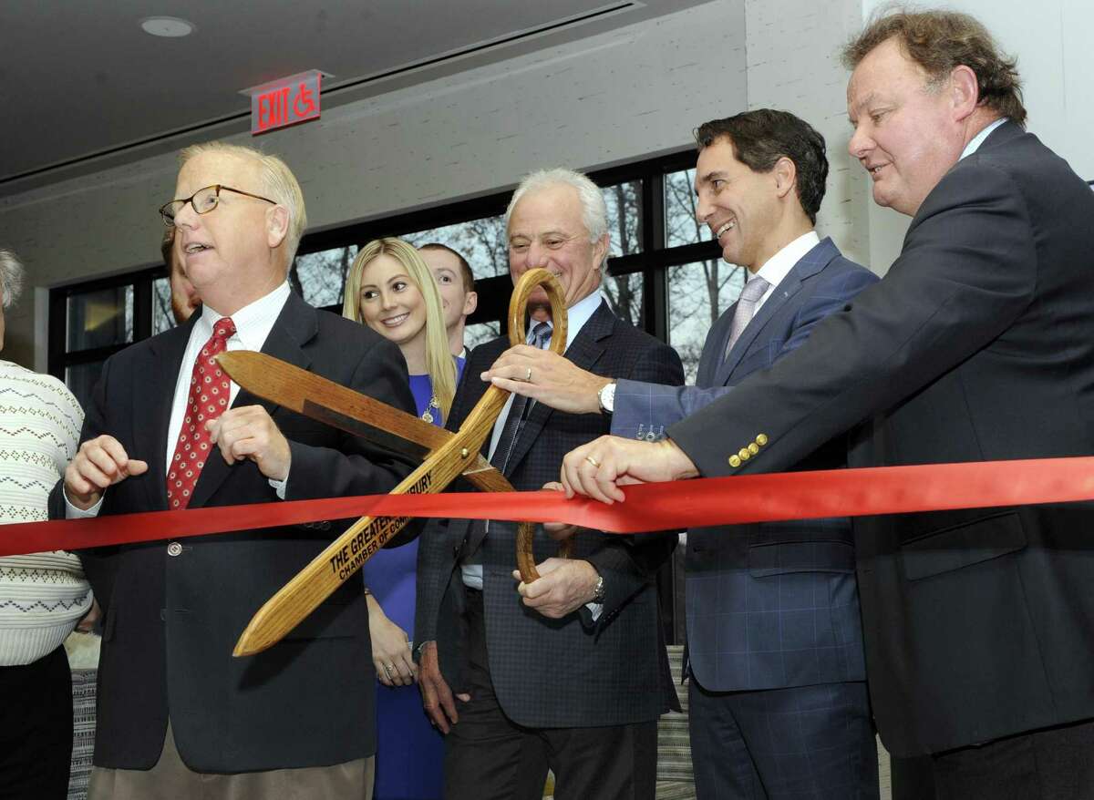Hotel Zero Degrees, a new luxury hotel on Milestone Road in Danbury, held an opening reception and ribbon-cutting Wednesday, Nov. 17, 2016. At the ribbon-cutting from left are Danbury Mayor Mark Boughton, Reina Sutch, sales director, Ramze Zakka, restaurateur, Randy Salvatore, and Charles Mallory, CEO of Greenwich Hospitality.