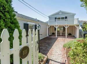Ron and Julie Malloy's cozy two-bedroom Downs Avenue home in Shippan is on the market for $938,000.