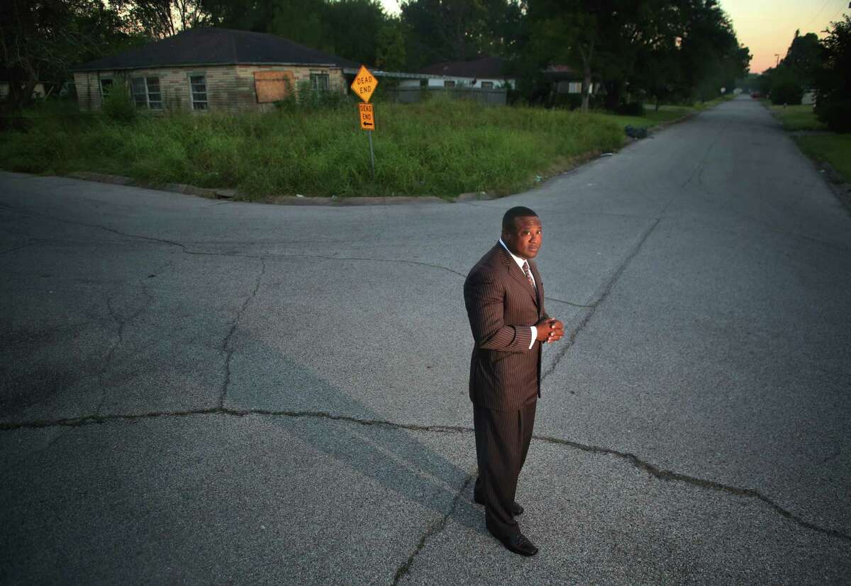 Quanell X, leader of the New Black Panther Party, during a visit to the South Acres street where he grew up, Tuesday, Oct. 25, 2016, in Houston. 