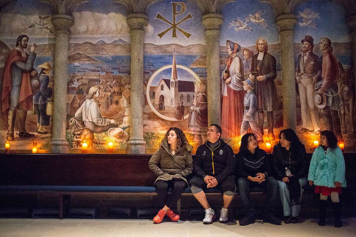 From left: Dayana, age 22; her father Miguel; her brother Joshua, age 14; mother Veronica; and sister Luana, age 6; listen in to church service at Grace Cathedral on Thursday, Nov. 17, 2016 in San Francisco, Calif.