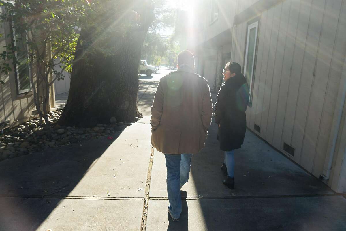 Jose Arias, left, and his girlfriend Crimson Olivares go out for coffee in Redwood City, Calif. on Friday, Nov. 18, 2016. Arias is one of the many people who is concerned that the information he exchanged to be apart of DACA could get him deported.