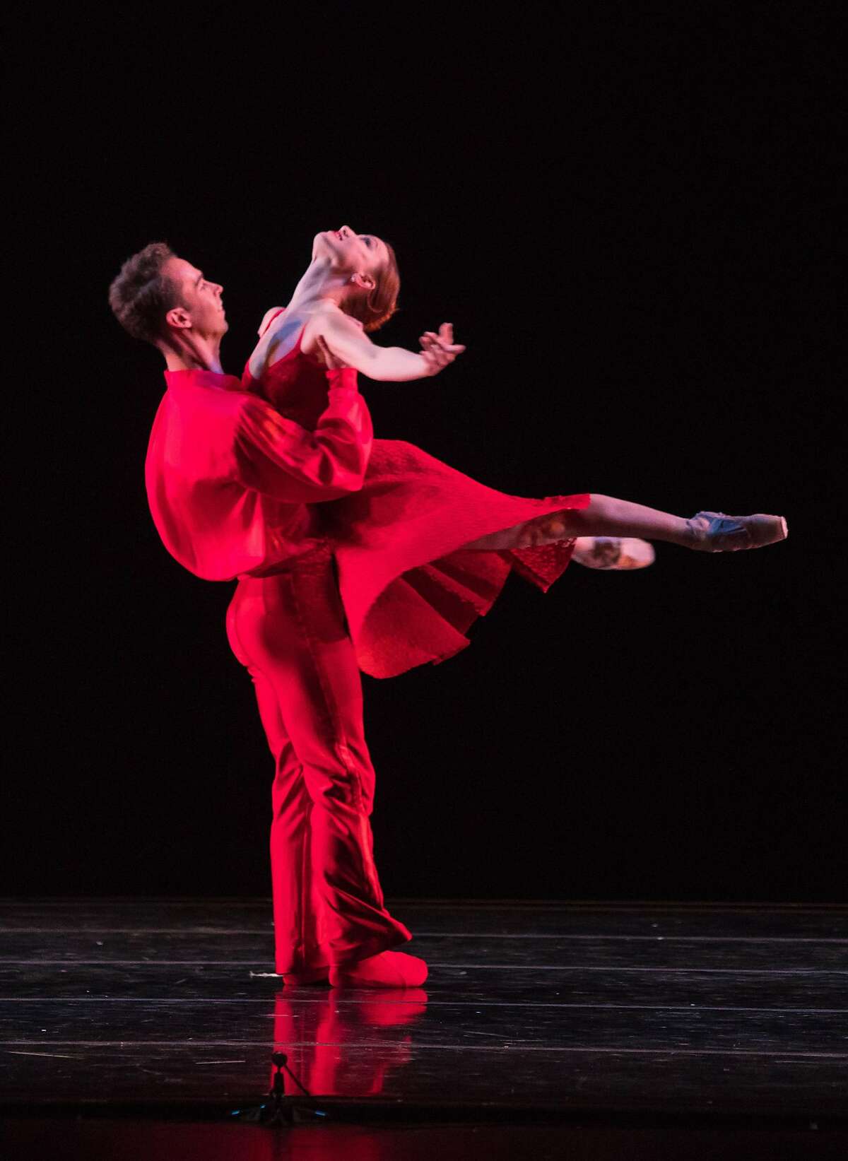 Ben Needham-Wood lifts Erin Yarbrough-Powell in "River" - a new work choreographed by Amy Seiwert for Smuin's annual The Christmas Ballet, playing through Dec. 24 in Walnut Creek, Carmel, Mountain View, and San Francisco. Photo credit: Keith Sutter