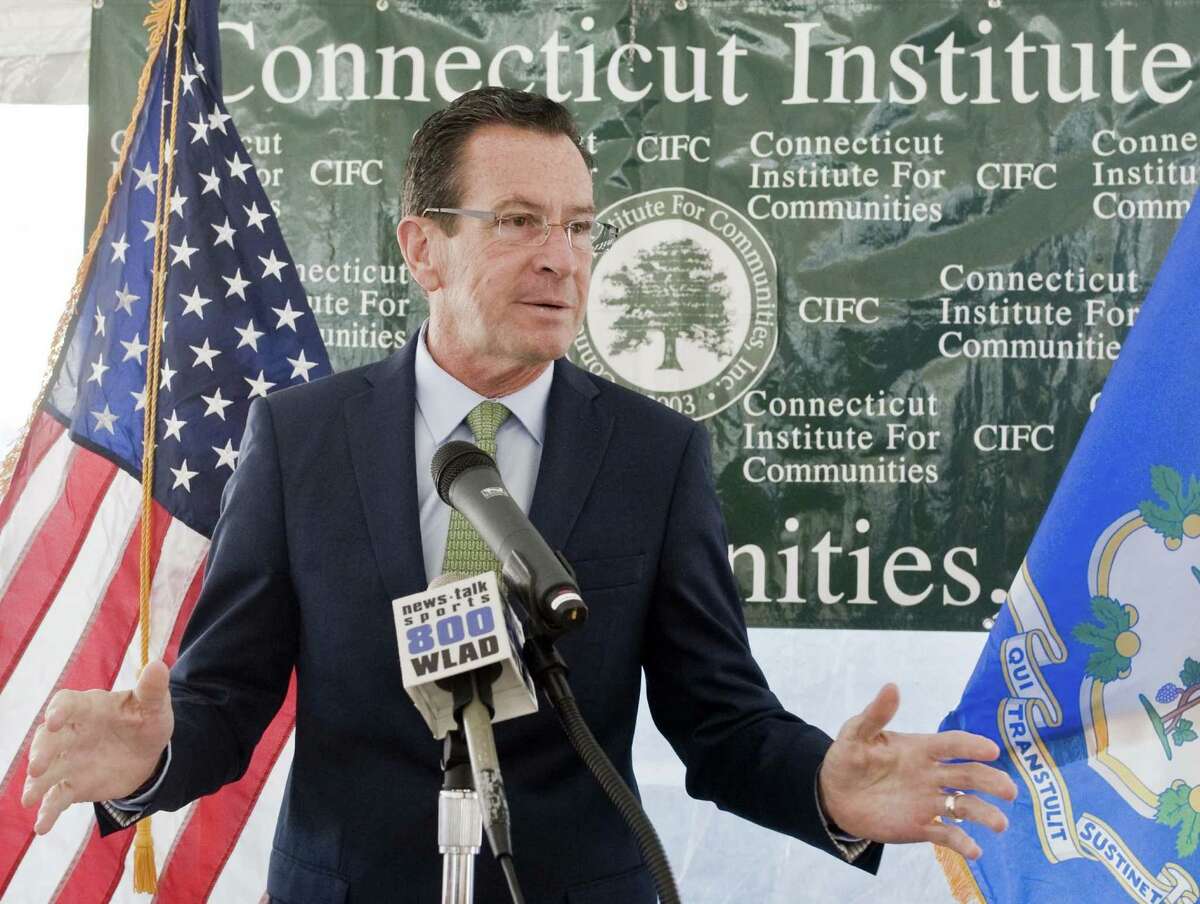 Connecticut Governor Dannel Malloy speaks to the gathering at the dedication ceremony at the new Greater Danbury Community Health Center on Main Street. Monday, Oct. 31, 2016