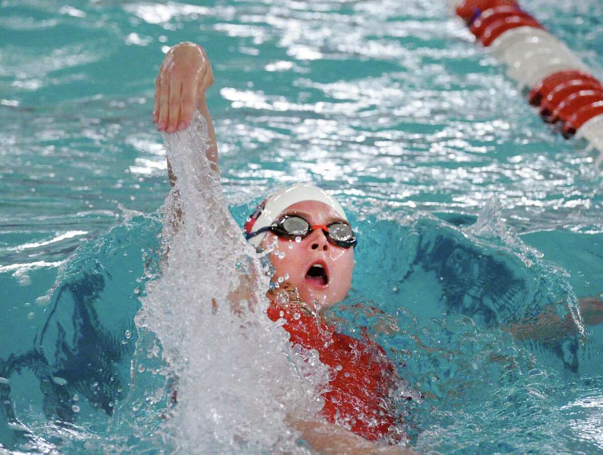 Junior Kelly Montesi competes in the 200 IM event that she finished second in during the FCIAC Girls Swimming Championship at Greenwich High on Nov. 3. The Cardinals cruised to their seventh straight Class LL title on Wednesday and compete in the State Open on Saturday.