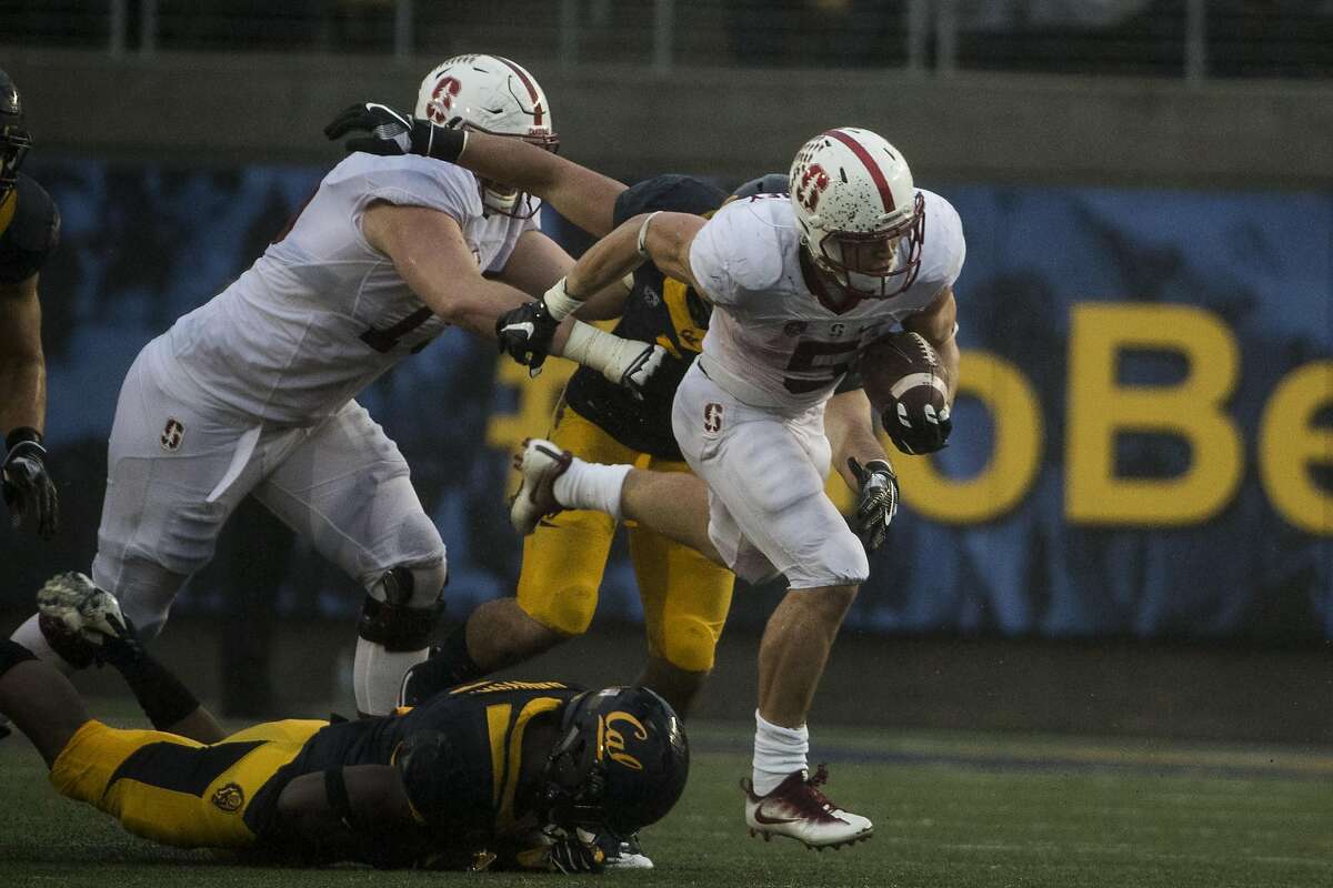 Running back Christian McCaffrey #5 of the Stanford Cardinal runs the ball during the second quarter of his game against the California Golden Bears at Kabam Field at California Memorial Stadium in Berkeley, Calif. on Saturday, Nov. 19, 2016.