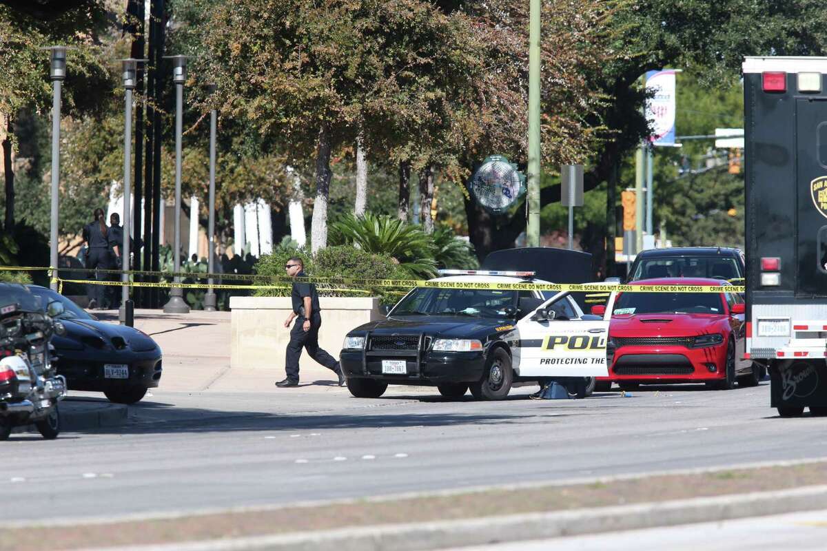 SAPD investigate the scene of an officer shot at the department's headquarters, Sunday, Nov. 20, 2016.