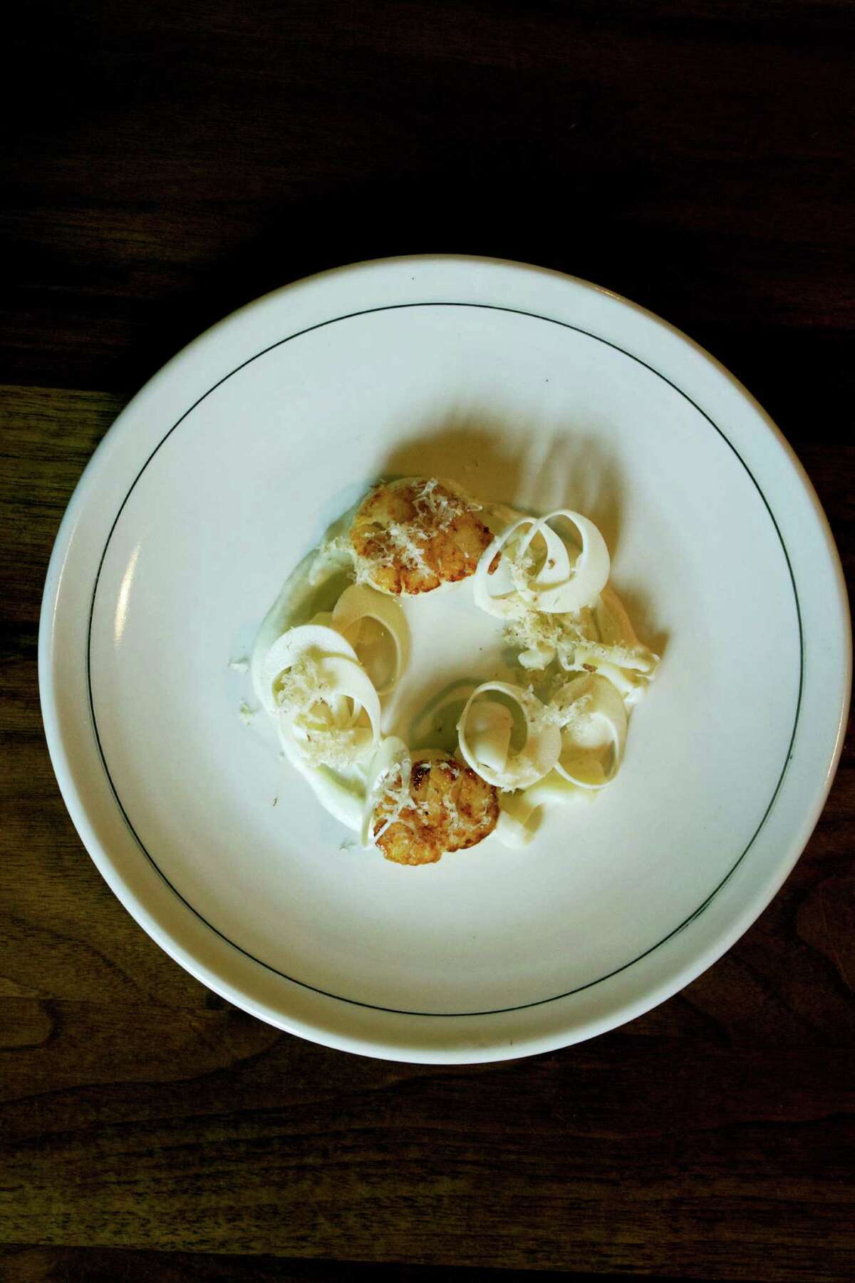 Hotate shiro (scallop, heart of palm, and Hon Shimeji (white beech) mushrooms from chef Lance Gillum at Uchi Houston.