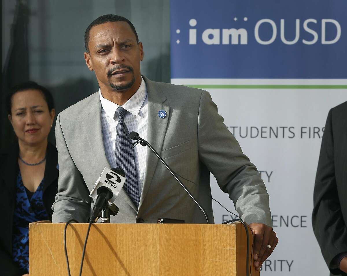 Oakland school board president James Harris announces that Superintendent Antwan Wilson is leaving the school district, at a news conference in Oakland, Calif. on Tuesday, Nov. 22, 2016. Wilson will step down from his position in February and will move to Washington, D.C. to become the Chancellor of District of Columbia Public Schools.