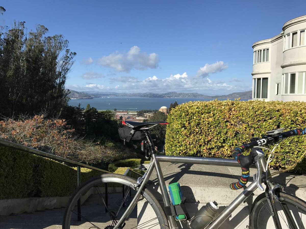 Bret Lobree takes a break and admires the view while completing the Turkey Ride in San Francisco on Nov. 21, 2016. 