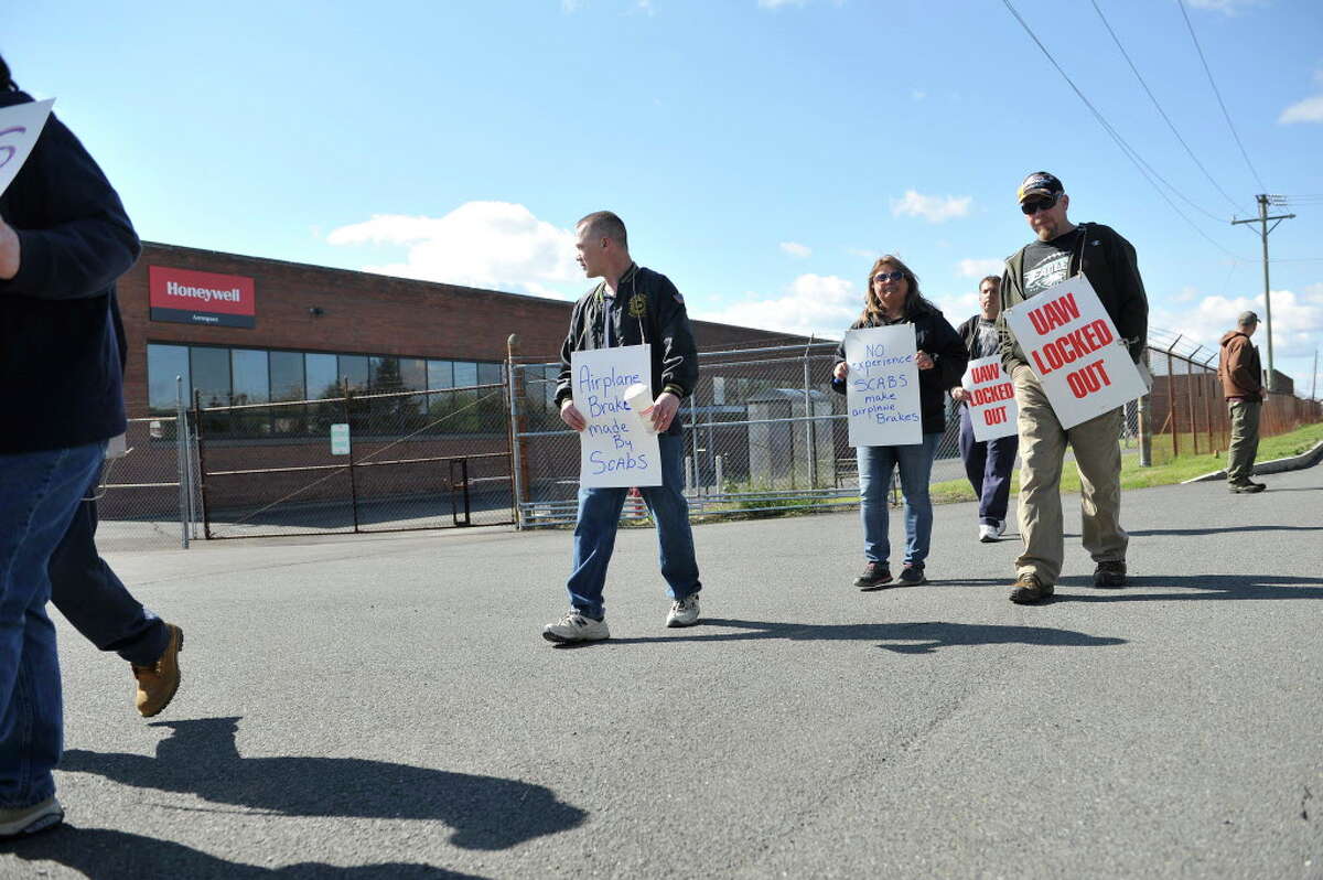 Honeywell workers picket outside the plant after the company locked out the workers early Monday morning, May 9, 2016, in Green Island, N.Y. (Paul Buckowski / Times Union)